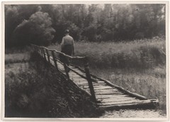 Original vintage 1930s wanderer on wooden bridge, by Erich Smeikal, pictorialism