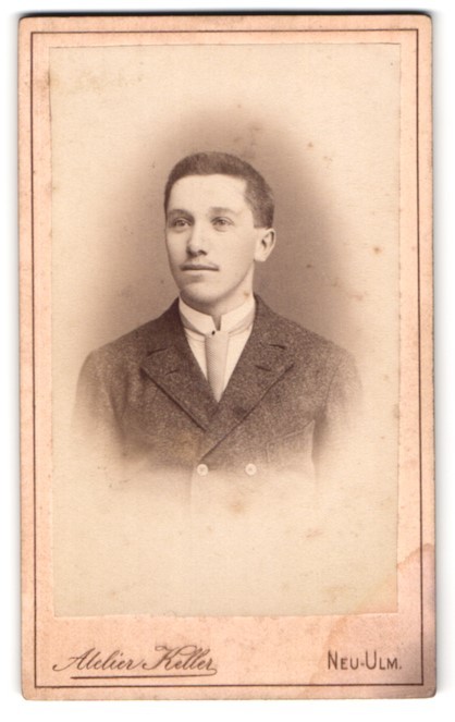 Photography cellar, Neu-Ulm, island, sympathetic youth with tie