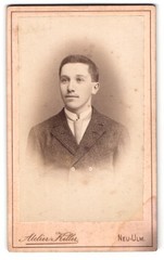 Photography cellar, Neu-Ulm, island, sympathetic youth with tie