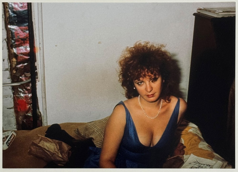 Nan Goldin, self-portrait in blue dress NYC 1985, pigment print, autographed