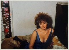 Nan Goldin, self-portrait in blue dress NYC 1985, pigment print, autographed