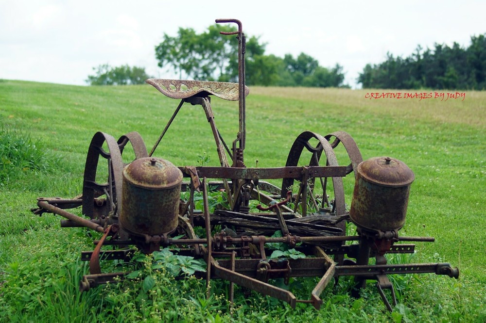 «Rusted Root» is a 1920’s to 1930’s Horse Drawn Planter wall art print.