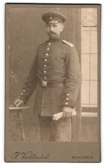 Photograph J. Vahlendick, Schleswig, soldier in uniform with peaked cap