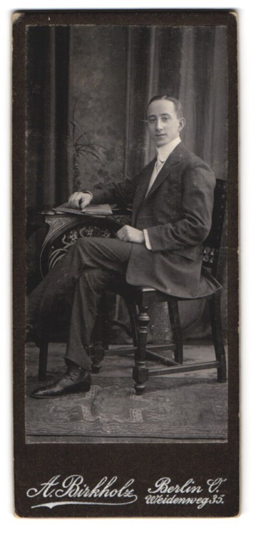 Photograph A. Birkholz, Berlin, Weidenweg 35, smiling young man in suit M