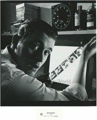Young photographer in studio with film vintage photo by Philippe Halsman