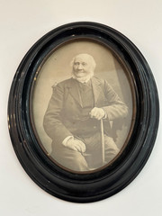 Oval Framed Black & White Sepia Photo of a Man with a Cane from Sweden b. 1823