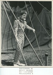 Sad clown posing by circus tent vintage art photo by Edward Quigley