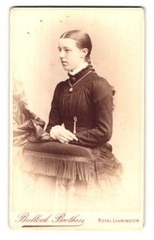 Photograph Bullock Brothers, Royal Leamington, 138 The Parade, Girl with fl