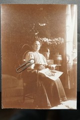 Photo portrait housewife mother illustrated book newspaper flower pot houseplant old