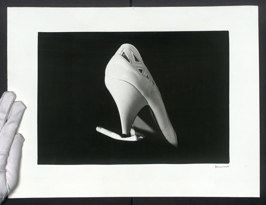 Photography Grunewald, white women’s pumps kicking out a cigarette, heel shoe,