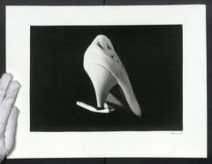 Photography Grunewald, white women’s pumps kicking out a cigarette, heel shoe,