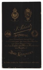 Photograph J. Pilartz, Bad Kissingen, woman in elegant dress next to padded