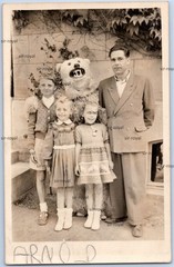 Man in Polar Bear Costume with Family – Photo Postcard 9x14cm