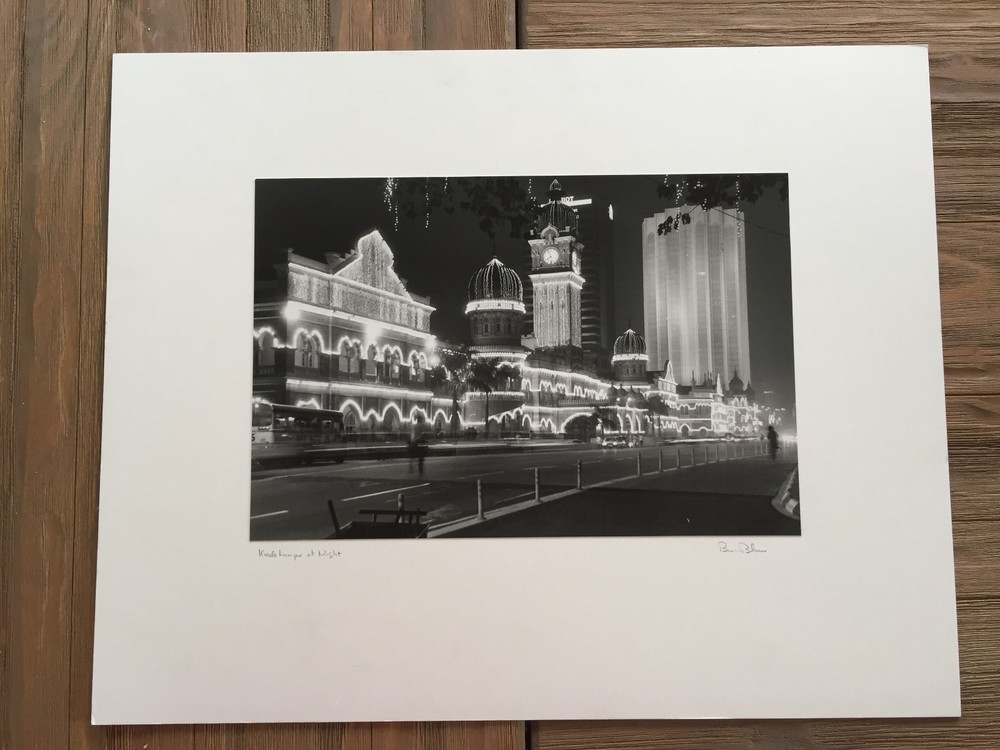BRUCE BLUM SIGNED B&W Photo Print (8 3/4″X13 «)- Kuala Lumpur at Night»