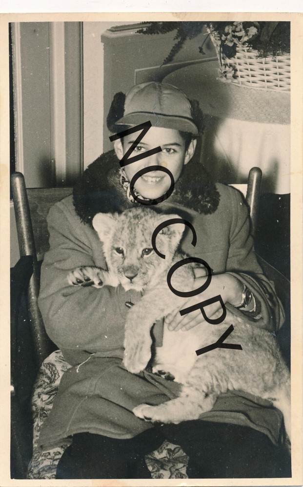 Photo Of Young Handsome Boy With Lion Cub 1954 X108