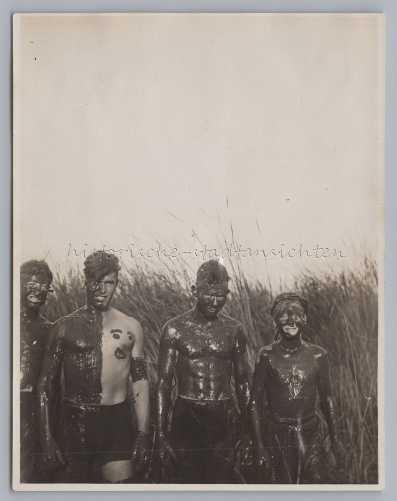 Boy with mud smeared in reeds – vintage photo 1930s