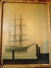 George E. Lee photo of fishing boat coming to port, seagulls,