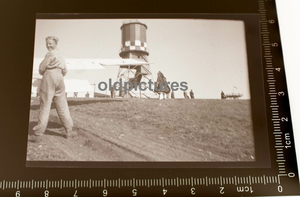 Great old negative – people on an airfield??? wing seen
