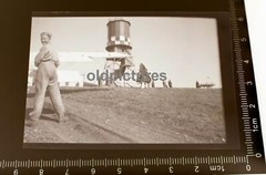Great old negative – people on an airfield??? wing seen