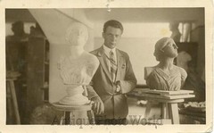 Sculptor artist with statues antique photo