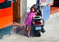 Neil Reichline Photo, «Girl with Motorcycle» Quatemala