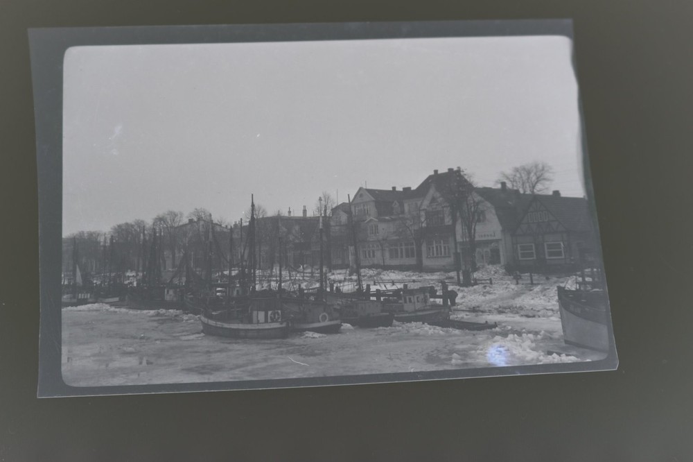 Great old negative fishing boat in harbour – place?? business loser 30-40s